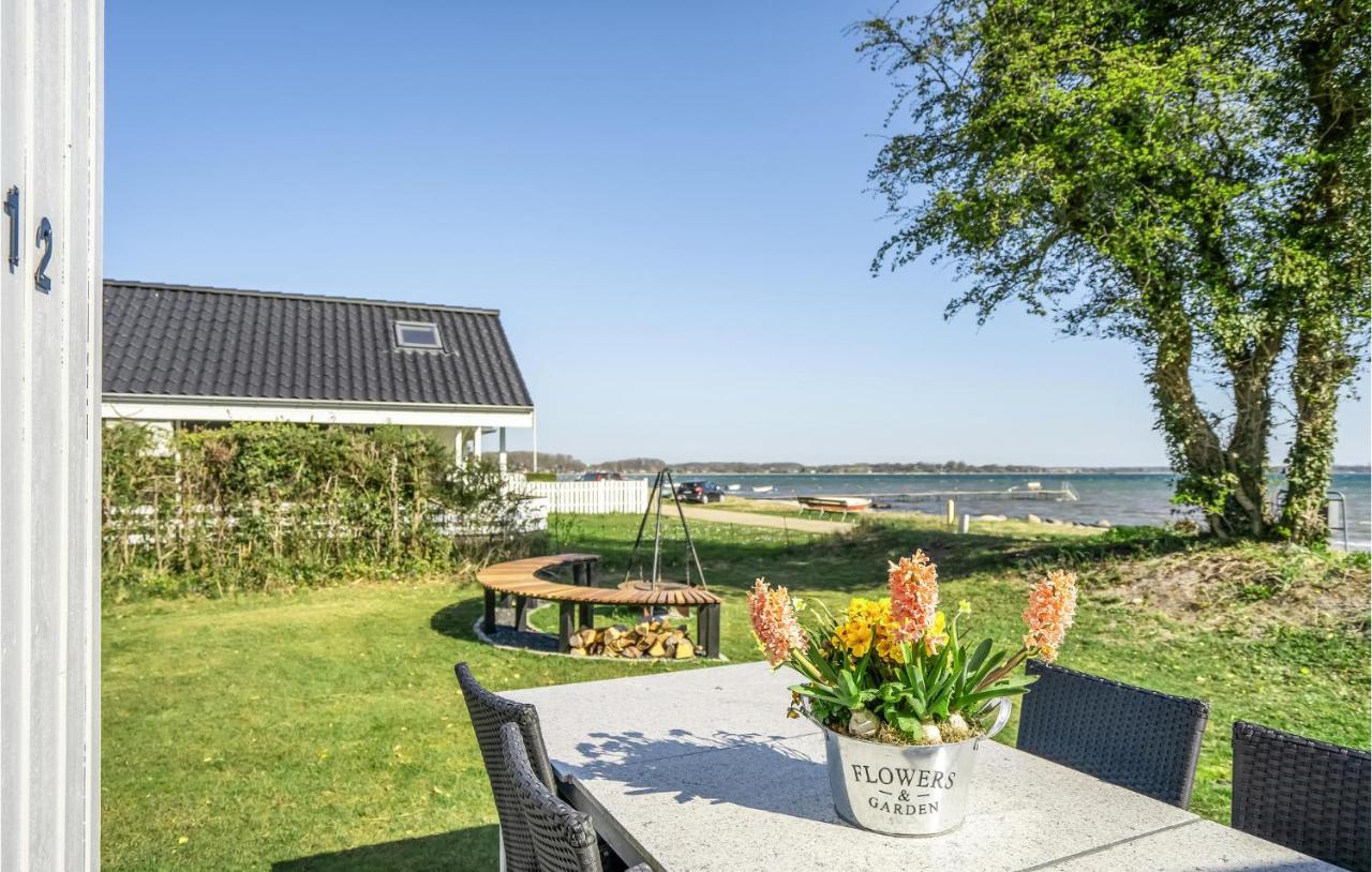 Beach Front Home In Sjolund With Kitchen Bagian luar foto